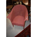 A vintage Lloyd Loom tub chair