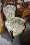 A reproduction French style armchair