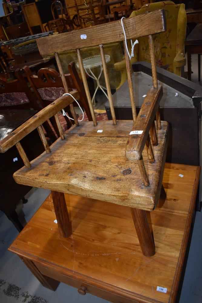 A rustic elm armchair in a provincial Irish style design, Having historical worm - Image 4 of 6