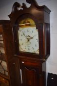 A 19th century mahogany 30 hour long case clock by M Bradberry, Leyburn, having a swan neck pediment