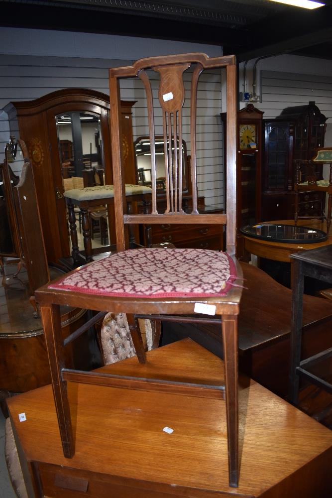 An Edwardian mahogany bedroom chair having inlay decoration