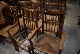 A set of six (four plus two) rush seated spindle back chairs