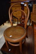 A traditional bentwood childs chair