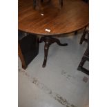 A 19th Century oak pedestal table having circular top turned column and triple splay legs,