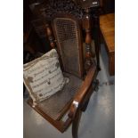 A Victorian beech frame folding campaign style chair having canework seat and back