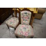 Two matching Victorian chairs having later upholstery