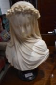 An Italian resin bust, veiled lady , signed