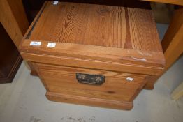 A stripped pine bedding box