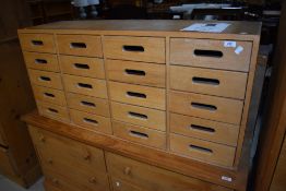 A utility/artists chest of 20 filing style drawers having open handles