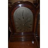 A late 19th/early 20th Century oak cased bracket clock , having silvered dial signed W Johnson,