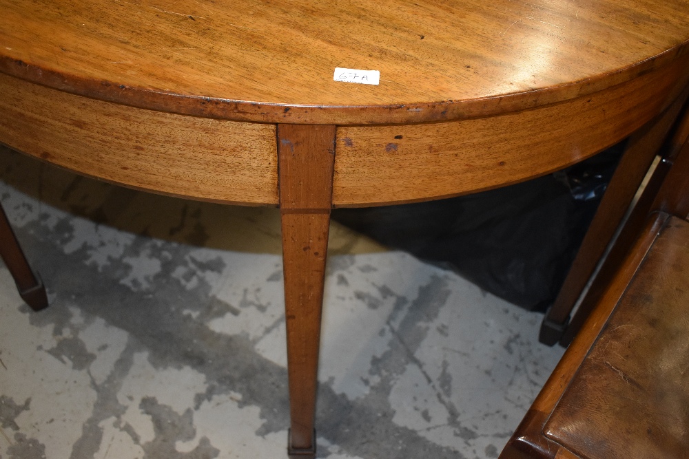 A 19th Century mahogany D end dining table , with single centre leaf , square tapered leg and