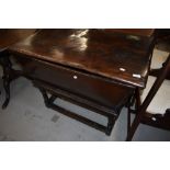 A period dough bin on turned legs, possibly Elm