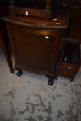 An early 20th Century mahogany side cabinet of large proportions with ball and claw feet