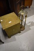A brass coal box and companion stand