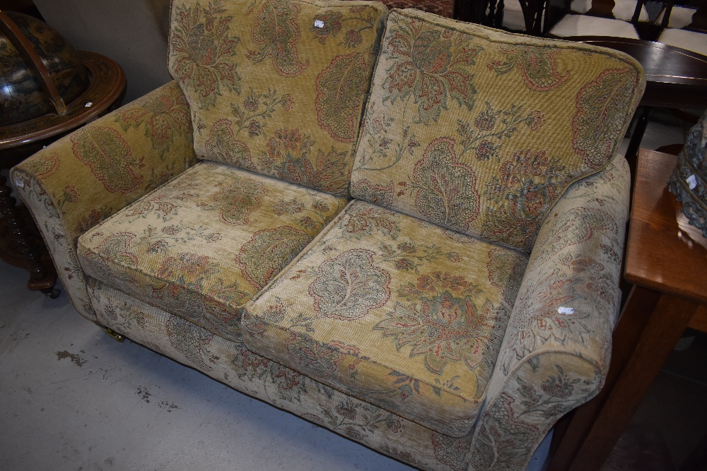 A modern two seater settee, very clean and tidy condition