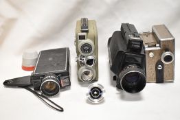 Four cine cameras. A Eumig C3, a Eumig Mini 3, a Pathescope A/F and a Bell and Howell Microstar 2
