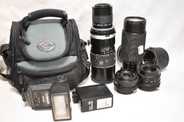 A Selection of lenses and camera equipment. A Tamron f=200 1:3,5 lens a Clubman MC Auto zoom1:5,6