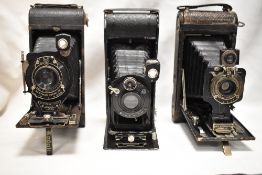 Three folding cameras