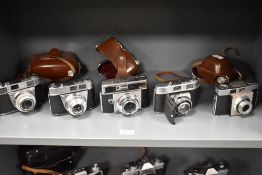 Four Kodak and one Agfa camera. A Kodak Colorsnap35, a Retinette 1A, a Retina IIC and a Retina