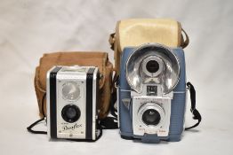 A Kodak Duaflex reflex camera and a Kodak Brownie Flash 20 camera