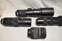 A selection of lenses including a Helios Auto zoom85-210mm f:3,8, a Sigma Telephoto 1:5,6 f=400mm, a