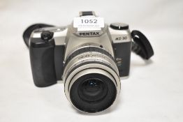 A Pentax MZ-30 with SMC Pentax-FA 1:4-5,6 35-80mm lens