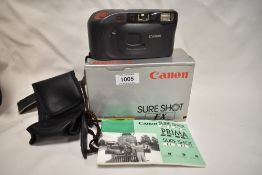 A Canon Sure Shot EX camera with canon 35mm 1:4,5 lens in original box