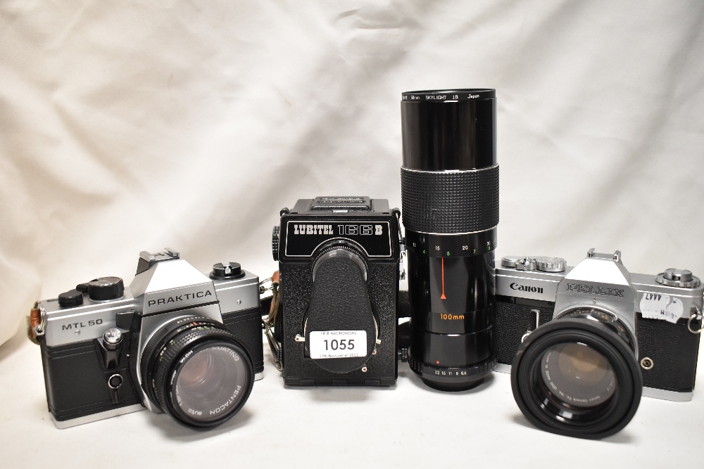 A selection of cameras. A Canon Pellix with a Canon FL 50mm 1:1;8 lens, a...