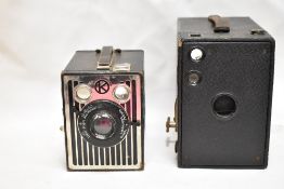 Two box cameras. A Kodak 2A Brownie and a Kodak six-20 Brownie