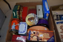 A selection of vintage tins and boxes, some Christmas themed.