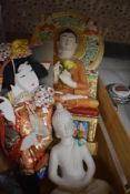 Two modern ceramic Buddha statues and a Japanese textile doll