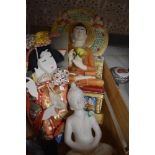 Two modern ceramic Buddha statues and a Japanese textile doll