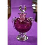 A vintage David Wallace studio art glass scent bottle with cranberry body