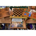 A vintage games compendium including Chess/Draughts , Tick Tack Toe. Chinese checkers and