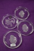 Four modern Hoya crystal glass bowls including dragon and the three monkeys