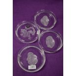 Four modern Hoya crystal glass bowls including dragon and the three monkeys