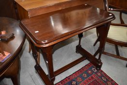 A Victorian mahogany side table in the Puginesque Gothic style