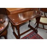 A Victorian mahogany side table in the Puginesque Gothic style