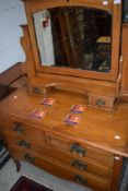 A Victorian satinwood dressing table