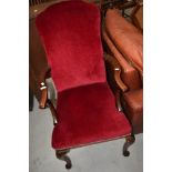 A Queen Anne style mahogany frame high back armchair having burgundy dralon upholstery