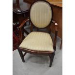 A Victorian mahogany spoonback carver chair