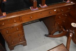 A Victorian oak pedestal desk with later refurbishments