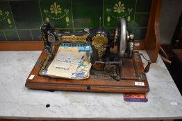 A vintage Jones hand crank sewing machine