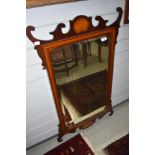 An Edwardian Chippendale style wall mirror