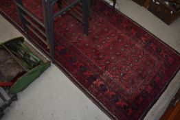 A traditional rug, approx. 193 x 90cm
