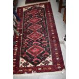A traditional Persian or similar rug, approx. 190 x 96cm