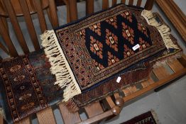 A selection of traditional prayer mats etc