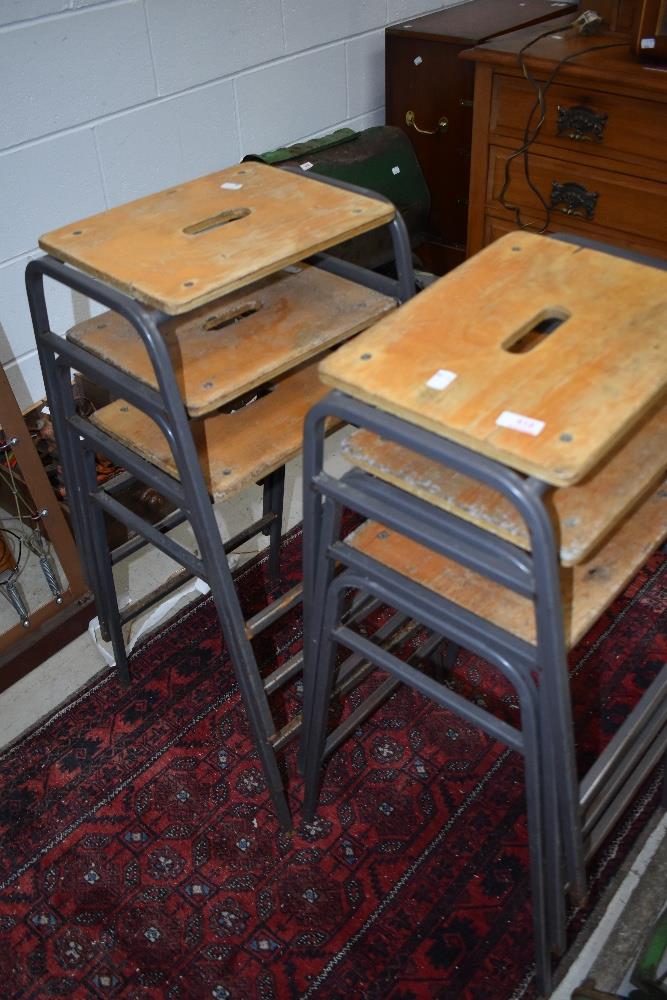 A set of six vintage school or industrial lab stools