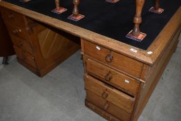A Victorian oak partners desk of large proportions, approx. 150 x 150cm