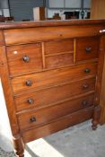 A Victorian mahogany scotch style chest of drawers (missing applique)